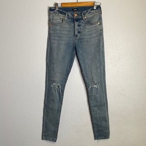 Express distressed raw hem mid rise skinny jeans size 8 long